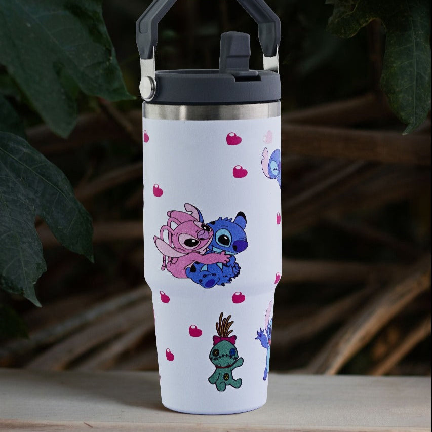 White water bottle with cartoon characters on a wooden surface with a leafy background