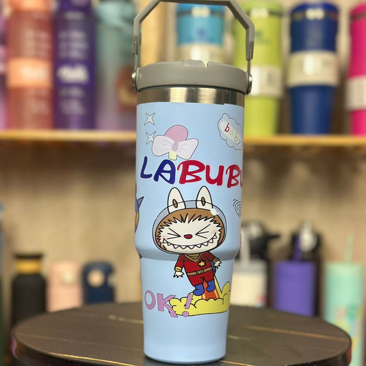 Colorful water bottle with cartoon design and 'LABUBU' branding on a wooden surface.