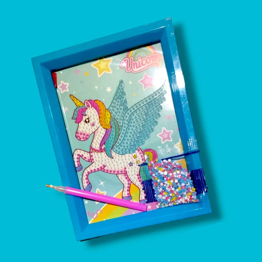 Coloring book with a unicorn design on a blue background