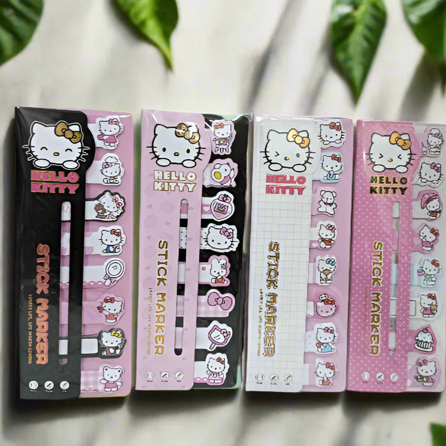 Four boxes of Hello Kitty stick markers on a light background with leaves.