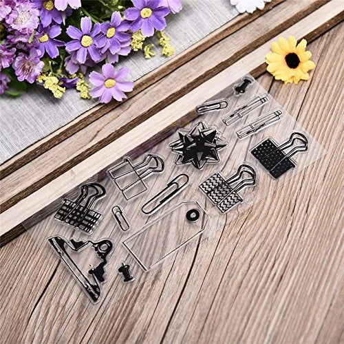 Clear stamp set with various shapes on a wooden surface with flowers in the background