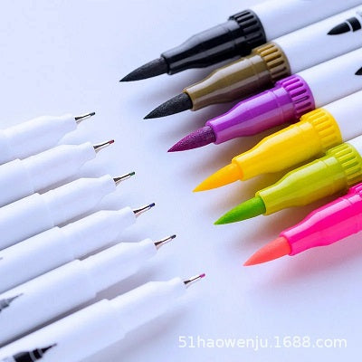 Set of white markers with colored tips on a white background