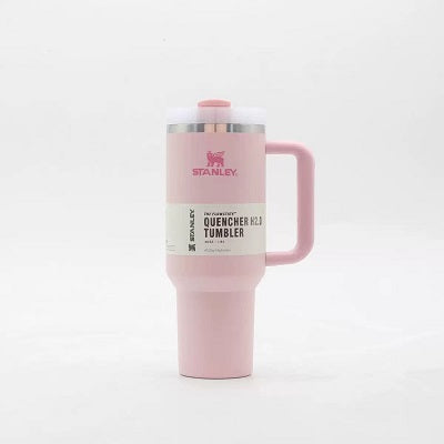 Pink Stanley tumbler on a white background