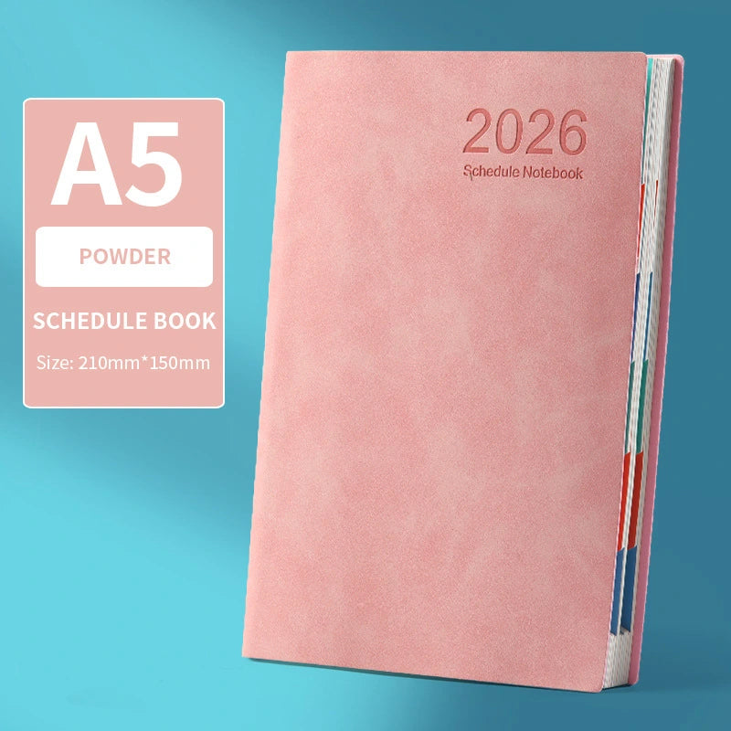 Pink A5 schedule notebook with '2026' on a blue background
