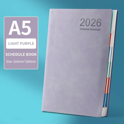 Light purple A5 schedule notebook with 2026 on a blue background