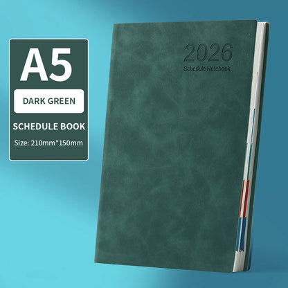 Dark green A5 schedule notebook with '2026' on a blue background