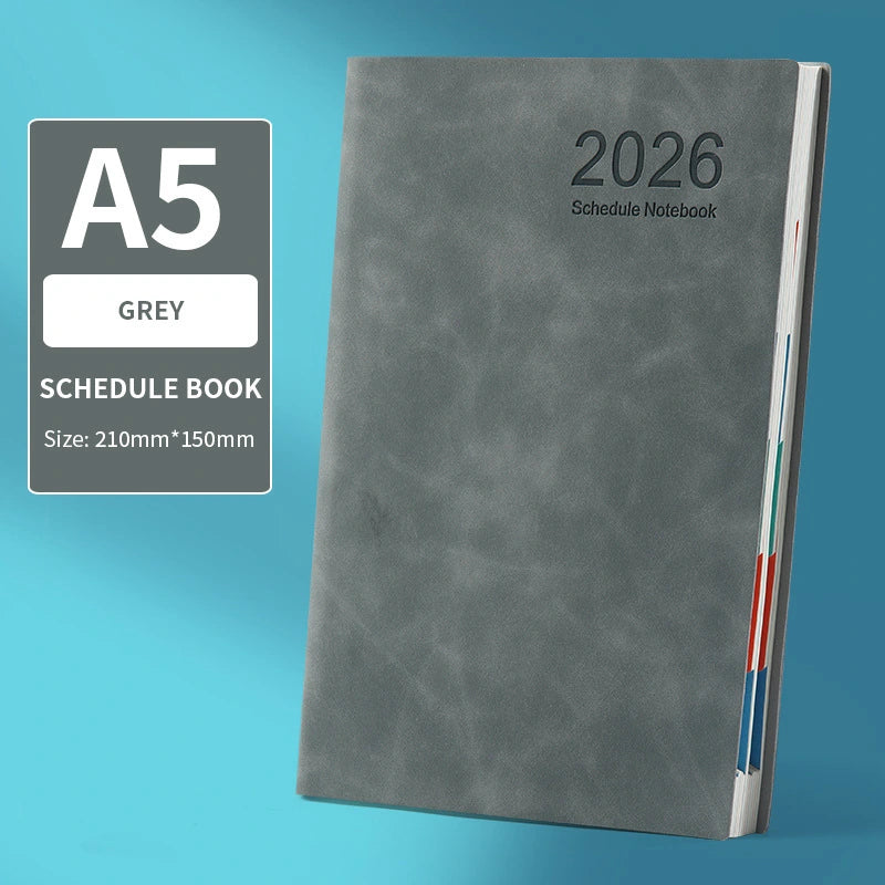 Gray A5 schedule notebook with '2026' on a blue background