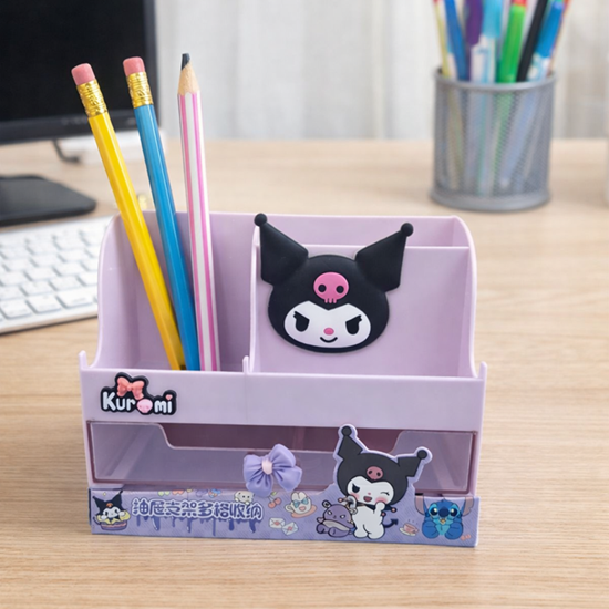 Kawaii-themed pencil holder with cartoon character on a desk