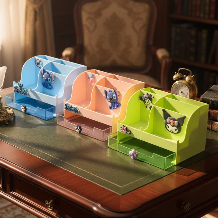 Three colorful desk organizers on a wooden desk with a bookshelf and chair in the background.