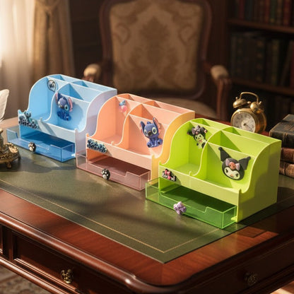 Three colorful desk organizers on a wooden desk with a bookshelf and chair in the background.