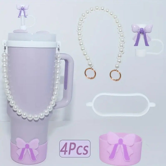Purple tumbler with pearl necklace, rings, and bow-shaped items on a light purple background.