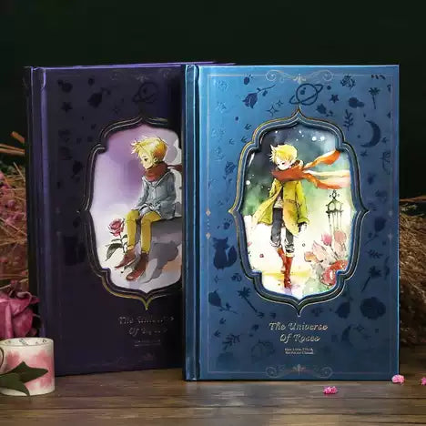 Two books titled 'The Little Prince' with illustrations of a boy and a fox on a wooden surface.