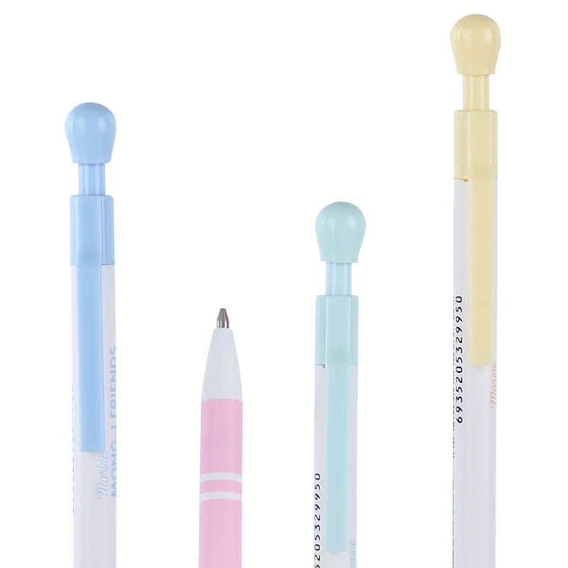 Set of four colorful pens with different colored caps on a white background
