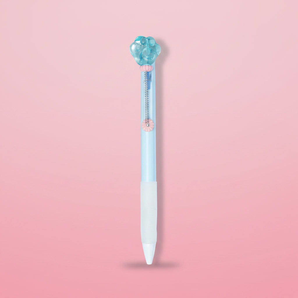 Light blue ballpoint pen with a decorative cap on a white background