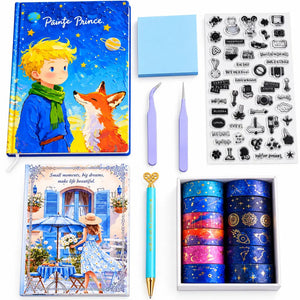A curated stationery and art gift set arranged on a white background, including a 'Painte Prince' hardcover notebook with a boy and fox illustration, a second illustrated notebook, a blue sticky note pad, clear stamp sheets, tweezers, a blue pen, and multiple rolls of decorative washi tape in blue, pink, purple, and galaxy designs.