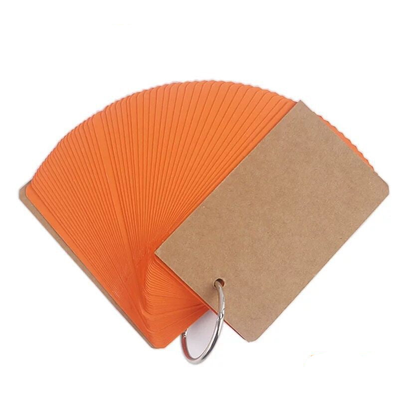 Orange cardstock with a brown tag on a white background