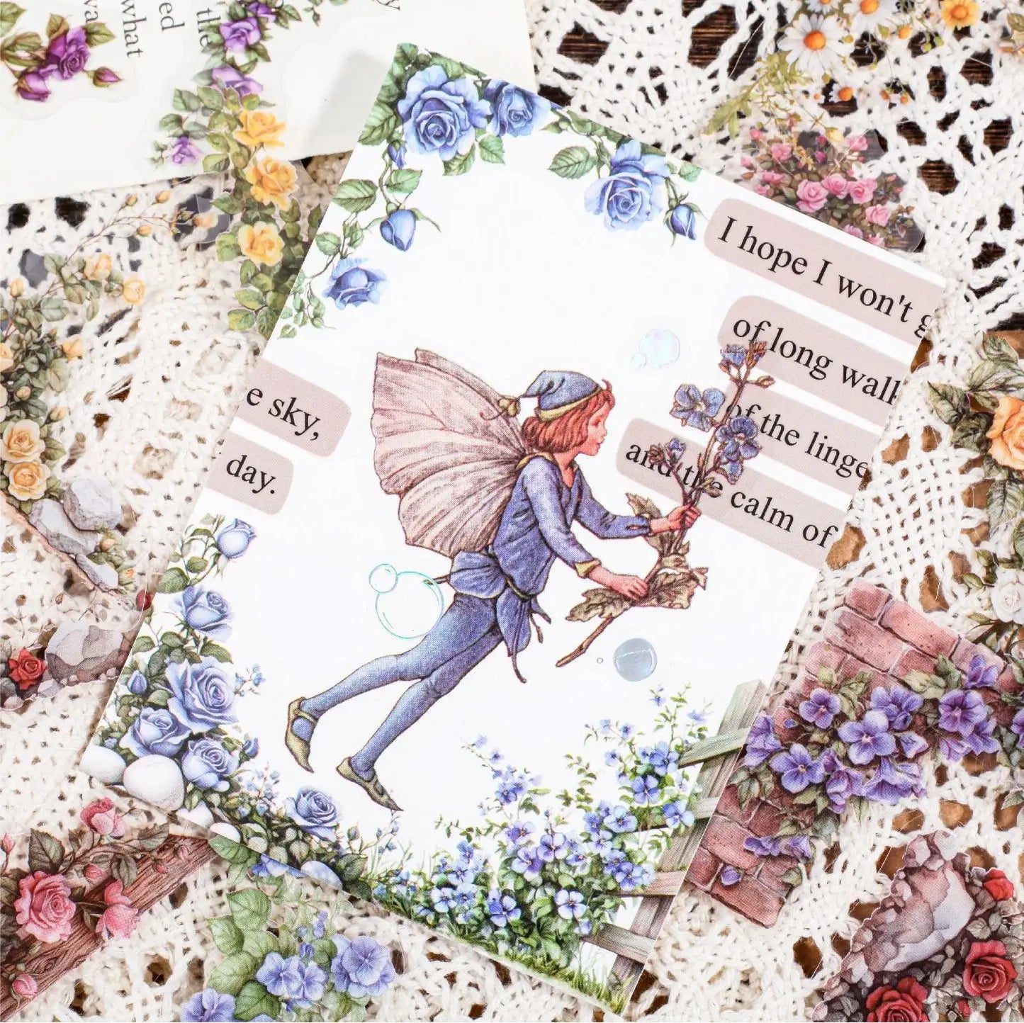 Collage of a fairy holding a wand with floral and lace patterns