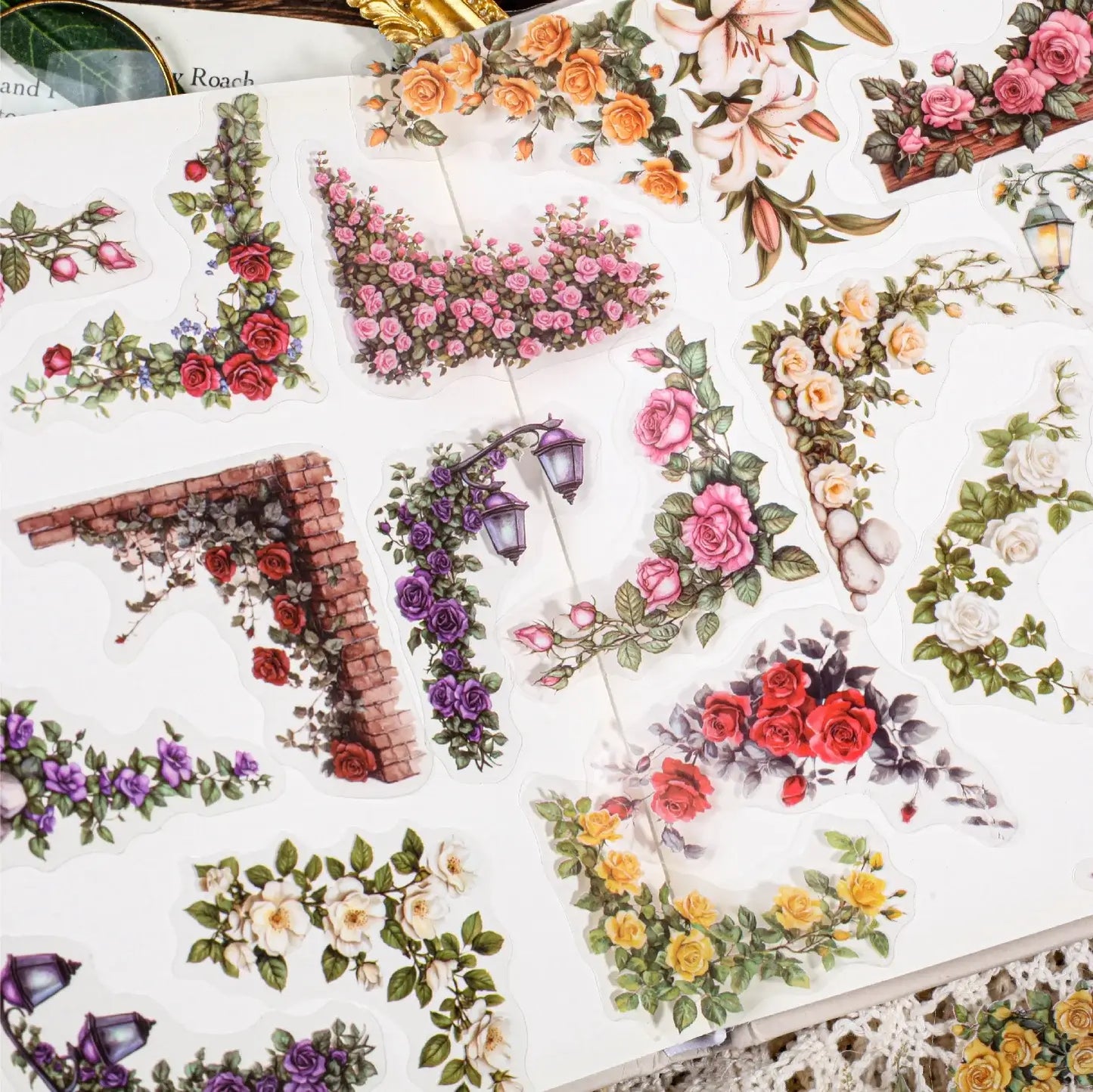 Decorative floral letter stickers on a white background