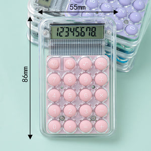 Calculator with pink buttons on a light blue background