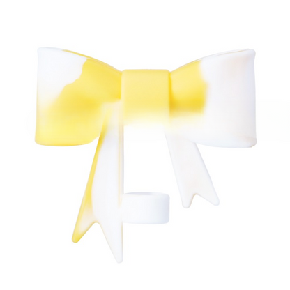 Yellow and white bow-shaped object on a white background
