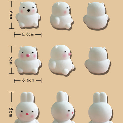 Measurement chart of various small animal figurines on a beige background