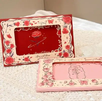 Decorative photo frame with floral design on a textured surface