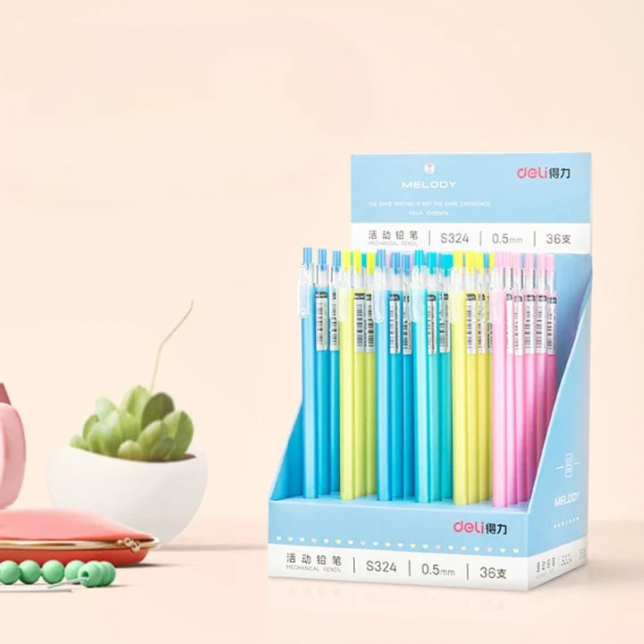Packaged gel pens with colorful barrels on a light pink background
