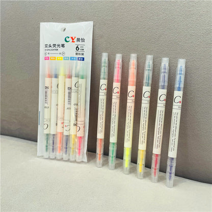 Set of colorful highlighters with packaging on a gray background