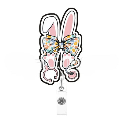 Decorative badge holder with bunny ears and bow on a white background