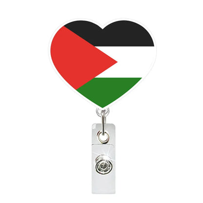 Heart-shaped badge holder with Palestinian flag design on a white background