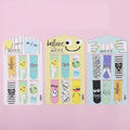A set of six double-sided magnetic bookmarks with various funky emoji designs on each, displayed on a pink background.