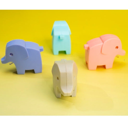 Four colorful elephant-shaped objects on a yellow background