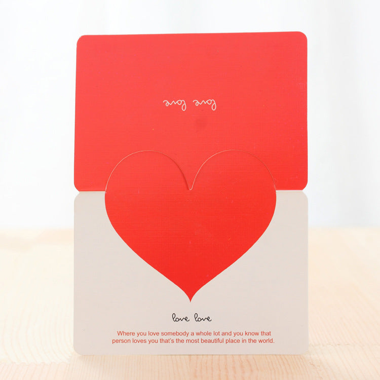 Red and beige card with heart design on a white background