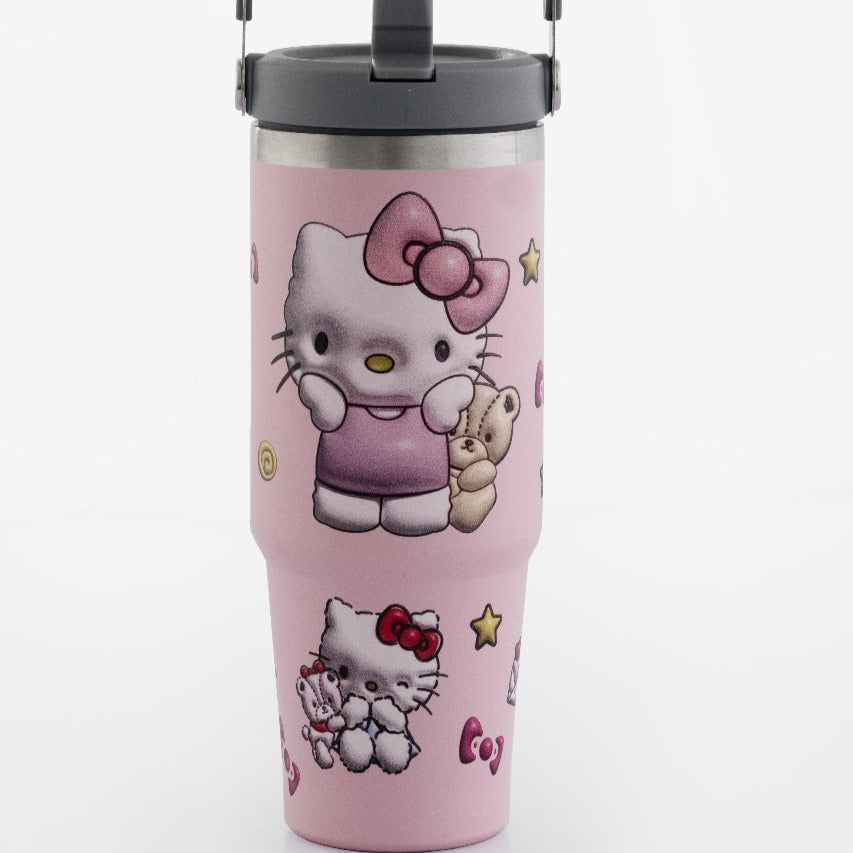 Pink tumbler with Hello Kitty design on a white background