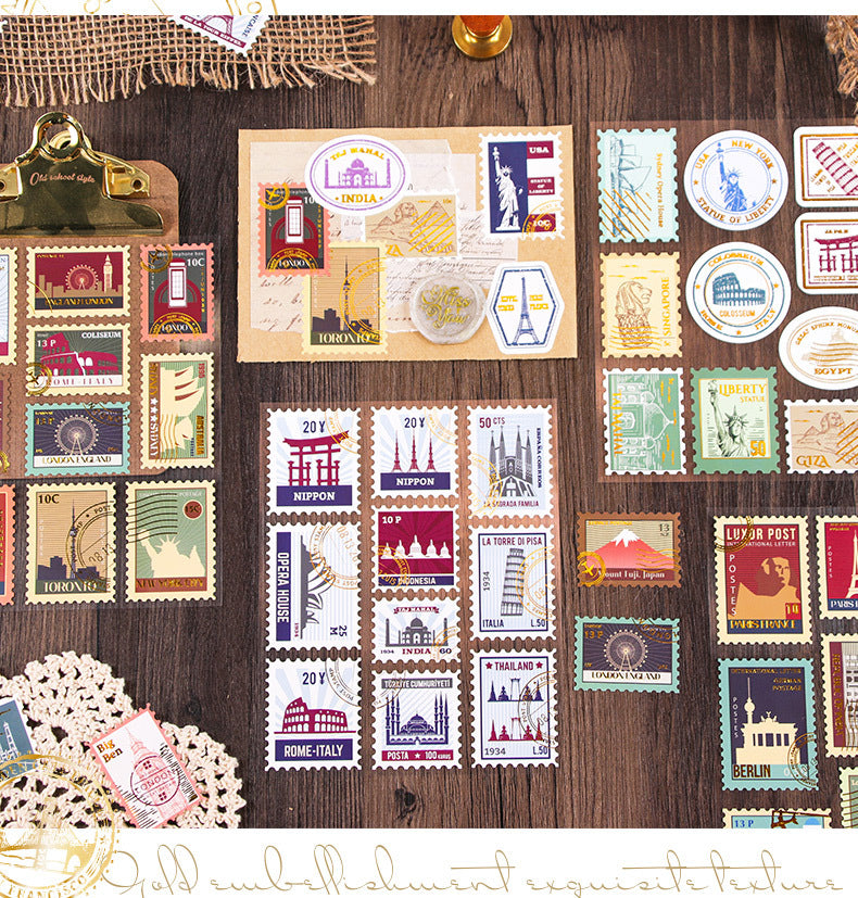 Collection of decorative postage stamps on a wooden surface