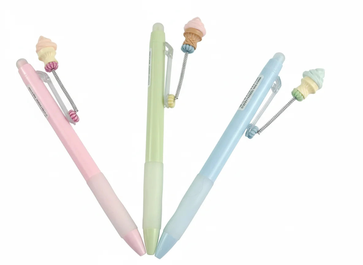 Three pastel-colored pens with ice cream cone ends on a white background