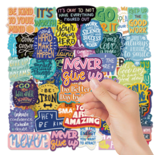 Hand holding a colorful assortment of motivational stickers with text like 'Never give up' and 'Keep up the good work'.