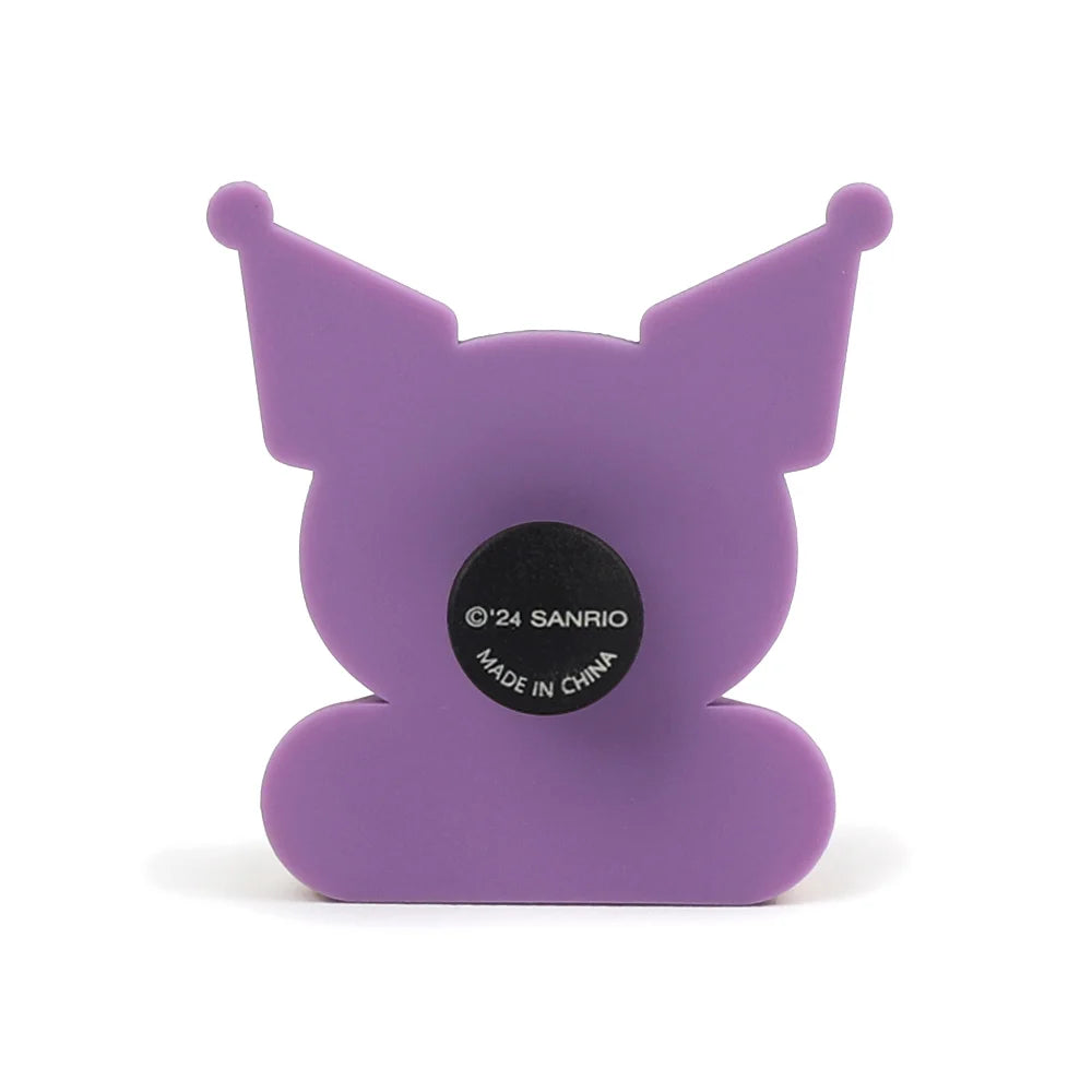 Purple cartoon character with a Sanrio logo on a white background