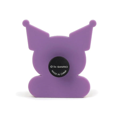 Purple cartoon character with a Sanrio logo on a white background