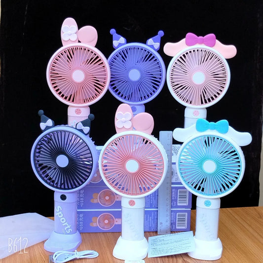 Set of colorful handheld fans with cartoon designs on a black background