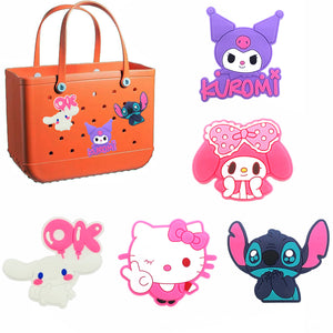 Orange tote bag with cartoon character stickers and a display of the characters above.