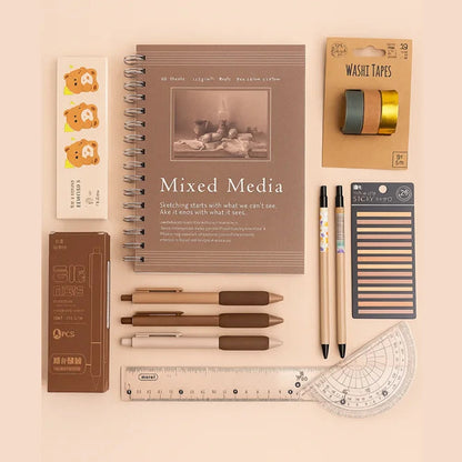 Collection of stationery items including a notebook, pens, tape, and rulers on a beige background.