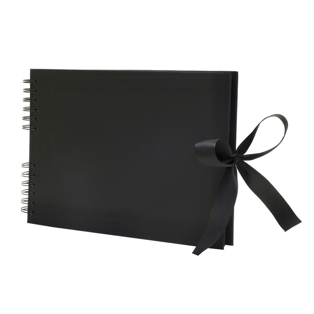 Black notebook with a black ribbon on a white background