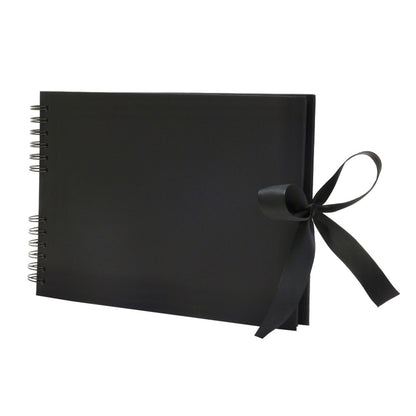 Black notebook with a black ribbon on a white background
