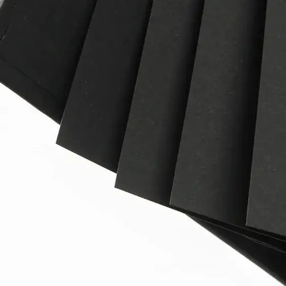 Black paper sheets on a white background