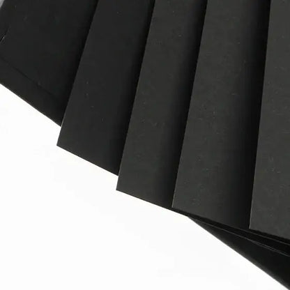 Black paper sheets on a white background