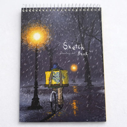 Sketchbook with illustration of a person with a yellow umbrella walking under streetlights in a snowy scene.