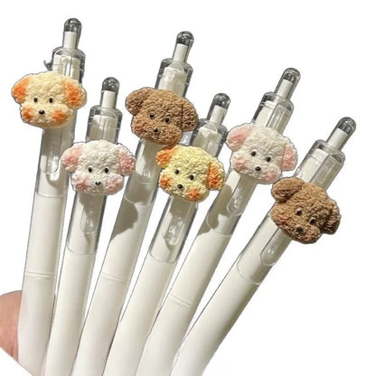 Set of pens with teddy bear-shaped tips on a white background