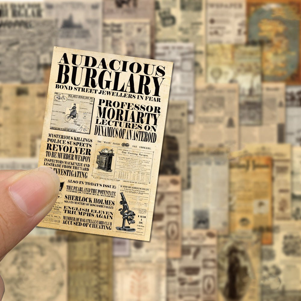 Miniature newspaper clipping held by a finger with a blurred collage of vintage newspaper clippings in the background.