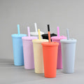 A collection of colorful double layer insulated boba cups with straws, available in blue, pink, yellow, black, and orange colors.